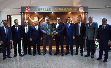 Aydın Commodity Exchange Paid a Visit to Efeler District Governor Ilker Arıkan in His Office 