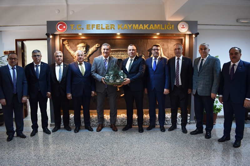 Aydın Commodity Exchange Paid a Visit to Efeler District Governor Ilker Arıkan in His Office 